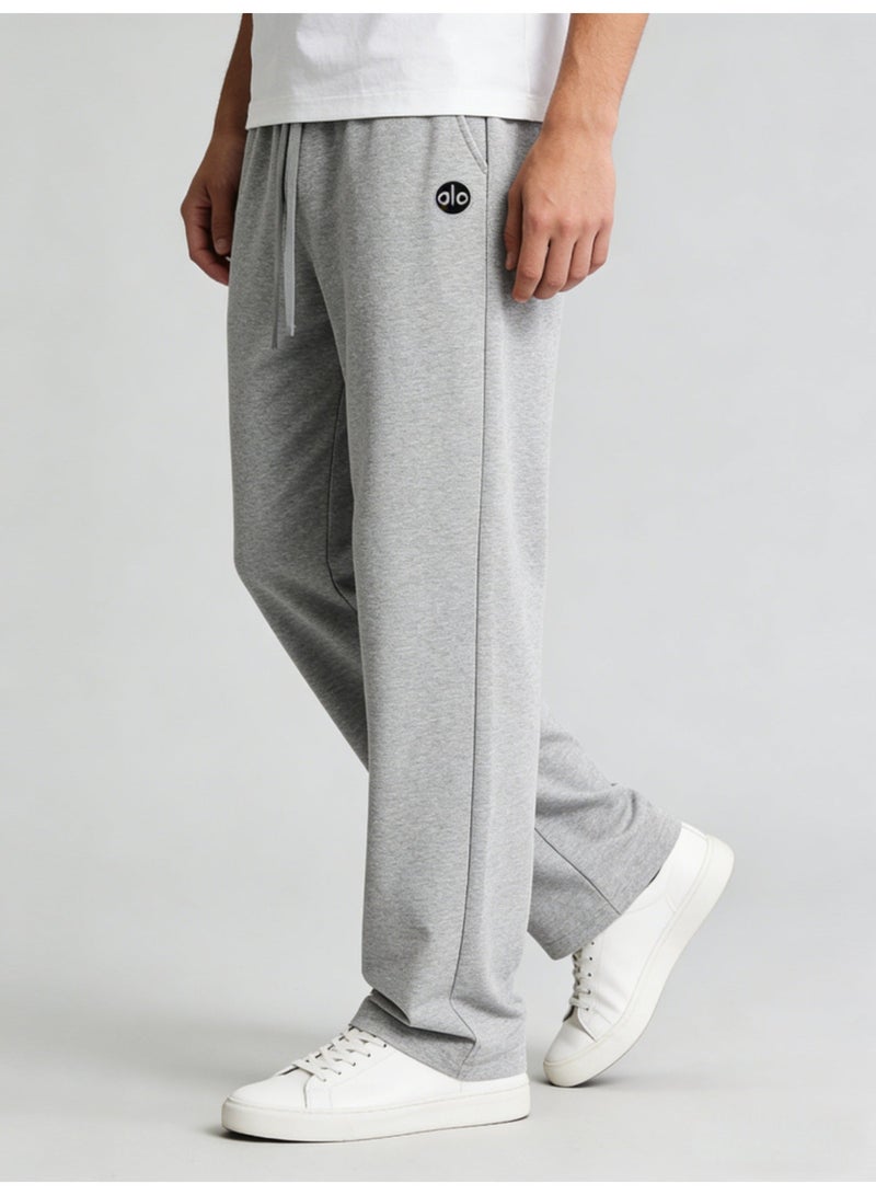 ألو يوغا Alo Yoga Ultra-Soft Wide-Leg Track Pants in Heather Grey - Image 1